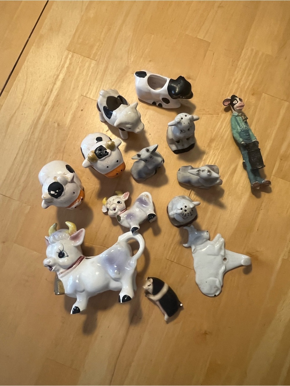 Vintage White and Black Ceramic Cow Figurine Collection